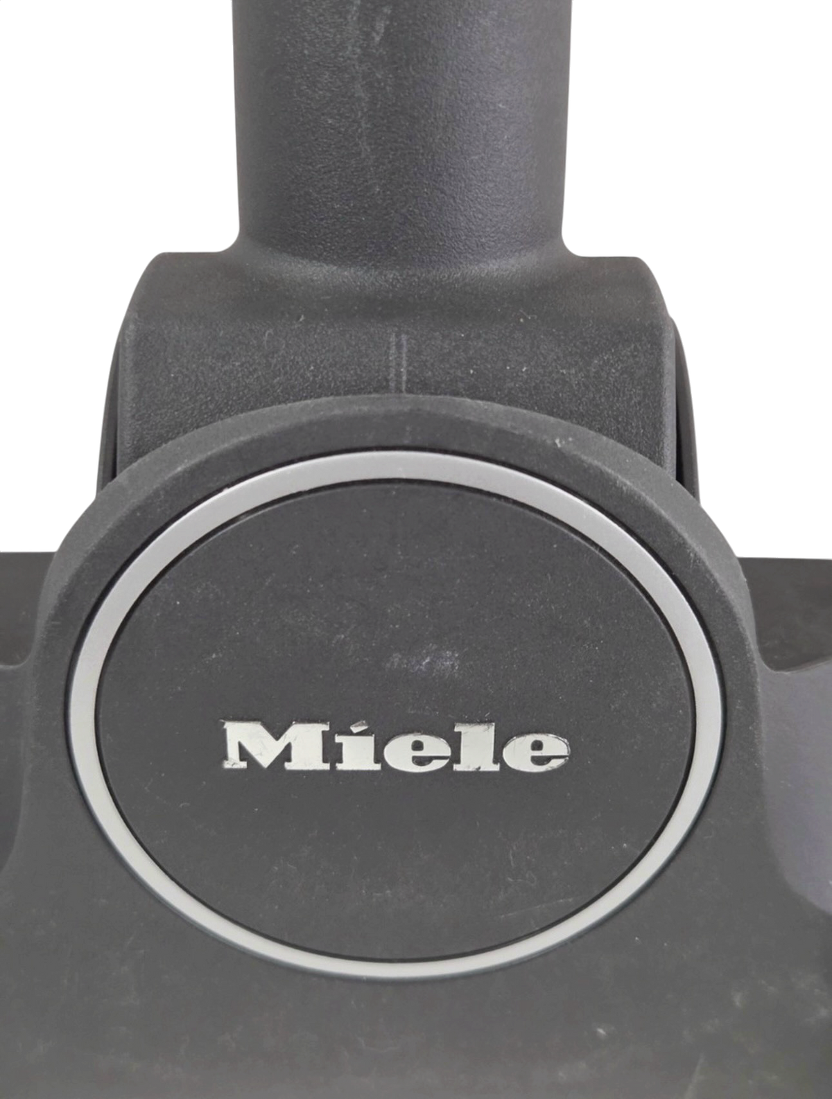 Miele AllTeQ SBD 365-3 floor brush head, close-up of the Miele badge